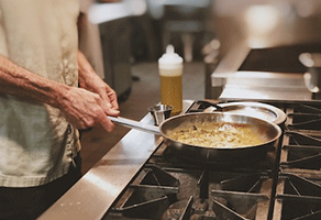 Our chef preparing Italian food at The Getaway Restaurant on Lake COmo
